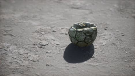 Alter-Fußball-Auf-Dem-Zementboden